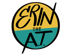 Erin the A.T. logo is encircled with a warm yellow colour on the top half and a teal colour on the bottom half. 